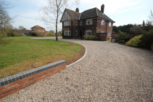 Shingle driveway resurfacing