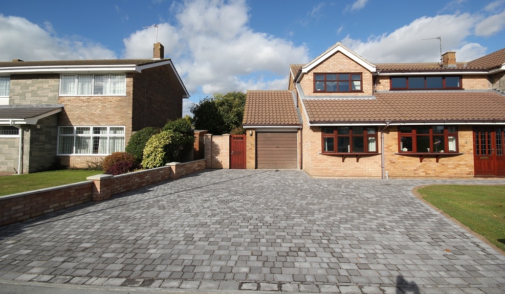 Charcoal block paving house