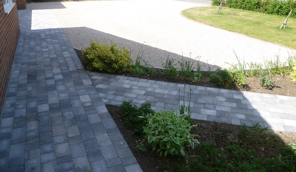 Chip driveway with paving paths